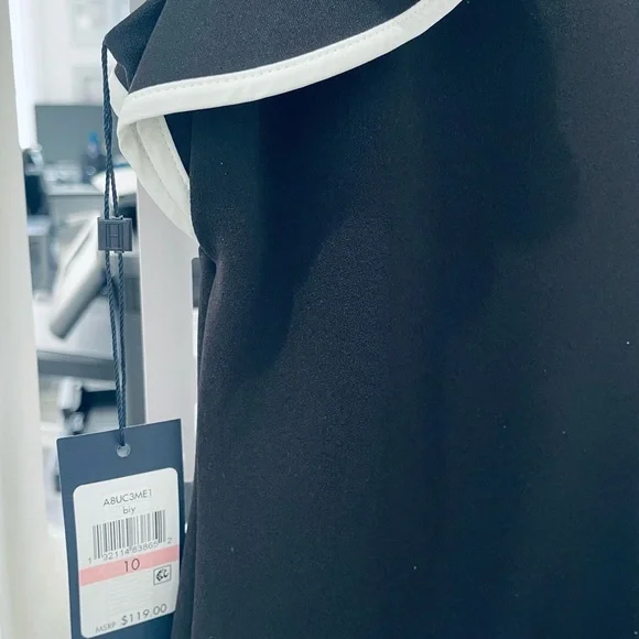 Elegant Black and White Ruffle Dress - Picture 5 of 8